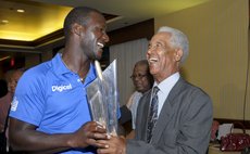 West Indies Captain Sammy and Sir Gary Sobers share a laugh