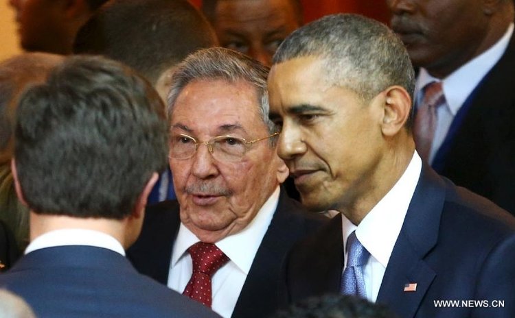 Obama, right and Raul Castro at the Summit of the Americas