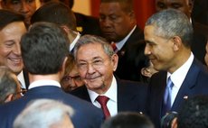 FILE PHOTO: Raul Castro and Obama at the Summit of the Americas