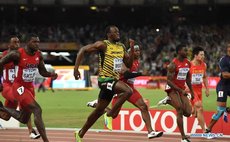 Bolt powers forward in the men's 100 metres race 