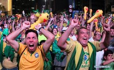 Crowd reacts while watching the live broadcast of the session's vote for the impeachment against Brazil's President Dilma Rousseff, in Sao Paulo, Brazil, on April 17, 2016. 