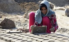 LAHORE, April 30, 2016 (Xinhua) -- A woman works at a brick factory ahead of International Labor Day in eastern Pakistan's Lahore on April 30, 2016. 