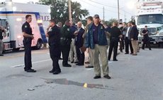 Photo provided by Orlando Police Department shows police officers at the site of the shooting incident in Orlando, Florida, the United States, June 12, 2016. 