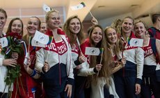  MOSCOW, July 28, 2016 (Xinhua) -- Russian athletes bid farewell to people at the Sheremetyevo airport in Moscow, Russia, July 28, 2016. 