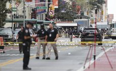  Investigators are seen near the blast site in New York, U.S., Sept. 18, 2016