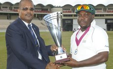 WICB vice President presents trophy to Lambert of the Jamaica team