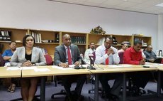 Prime Minister Skerrit and other Government officials at the signing ceremony