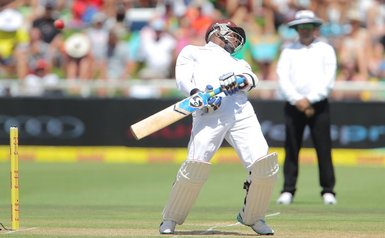 West Indies batman Marlon Samuels gets out of harm's way against South African bowler