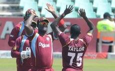 West Indies celebrate the taking of a wicket