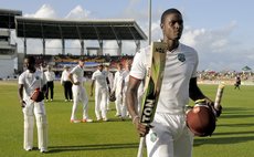 Jason Holder leaves the field after scoring maiden Test century