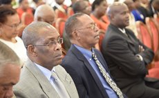 Cecil Joseph , manager of DBS , first in row, at the CCJ accession ceremony in 2015