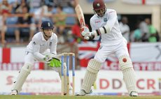 Samuels watches the ball closely