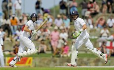 Joe Root and Ian Bell take a single in recovery partnership