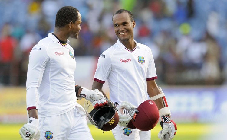 Marlon Samuels, left, and Kraigg Brathwaite are all smiles at the end of day four
