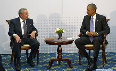 Presidents Obama, right, and Castro meet in Panama