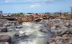 The Massacre river blocks the Massacre bridge with debris