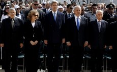 Kerry, US Secretary of State, centre, and Israel officials