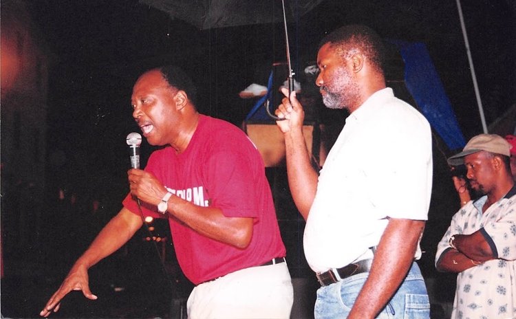 The late Roie Douglas and the late Pierre Charles