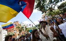 CARACAS, Feb. 15, 2014 (Xinhua) -- Oppositions gather to protest against recent political violence that killed three at Alfredo Sadel de Las Mercedes Square in Caracas, Venezuela, on Feb. 15, 2014. Ma