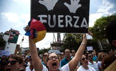 CARACAS, Feb. 28, 2014 (Xinhua) -- Opposition supporters take part in a demonstration at the Alfredo Sadel Square, in the municipality of Baruta, in Caracas, Venezuela, on Feb. 28, 2014. (Xinhua/Boris