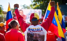 HAVANA, March 6, 2014 (Xinhua) -- People participate in a meeting to commemorate the first anniversary of the death of former Venezuelan leader Hugo Chavez, in Havana, capital of Cuba, on March 5, 201