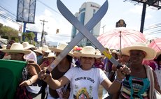 TEGUCIGALPA, March 7, 2014 (Xinhua) -- Honduran Women attend a demonstration on the occasion of the International Women's Day in front of the Presidential House in Tegucigalpa, Honduras, on March 7, 2