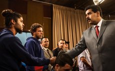 CARACAS, March 15, 2014 (Xinhua) -- Venezuela's President, Nicolas Maduro (R) greets a relative of one of the persons killed during the protests in the country, at a press conference in Caracas, Venez