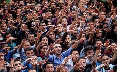 CAIRO, March 19, 2014 (Xinhua) -- Anti-Military university students take part in a protest in the Cairo university campus, March 19, 2014. 