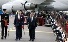 AMSTERDAM, March 22, 2014 (Xinhua) -- Chinese President Xi Jinping(R) reviews an honour guard accompanied by Dutch King Willem-Alexander (C) in Amsterdam, the Netherlands, March 22, 2014. 