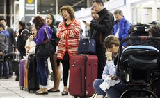 SANTIAGO, April 2, 2014 (Xinhua) -- People wait at the Arturo Merino Benitez Airport as flights are cancelled following an earthquake in Santiago, capital of Chile, on April 2, 2014. 