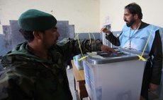 KABUL, April 5, 2014 (Xinhua) --  An Afghan man casts his vote in a polling center  in Kabul, Afghanistan on April 5, 2014.  