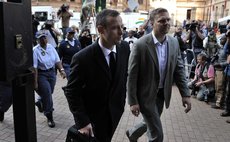 Pistorius, left, goes to court