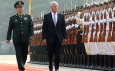 BEIJING, April 8, 2014 (Xinhua) -- Chinese State Councilor and Defense Minister Chang Wanquan (L) and U.S. Defense Secretary Chuck Hagel (R) welcoming ceremony before their talks in Beijing, China.  