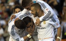 VALENCIA, April 17, 2014 (Xinhua) -- Players of Real Madrid celebrate after scoring during the Spanish King's Cup at the Mestalla stadium in Valencia, Spain on April 16, 2014. 