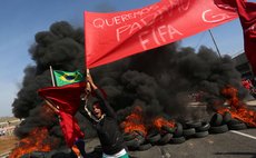 SAO PAULO, May 15, 2014 (Xinhua) -- Members of the Homeless Workers' Movement (MTST) take part in a protest against the high cost of the World Cup Brazil 2014.