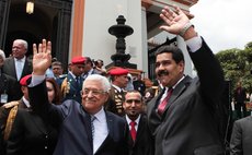 CARACAS, May 16, 2014 (Xinhua) -- Venezuelan President Nicolas Maduro (R) and Palestinian President Mahmud Abbas waving during Abbas' visit to the National Pantheon in Caracas, Venezuela, on May 16, 2