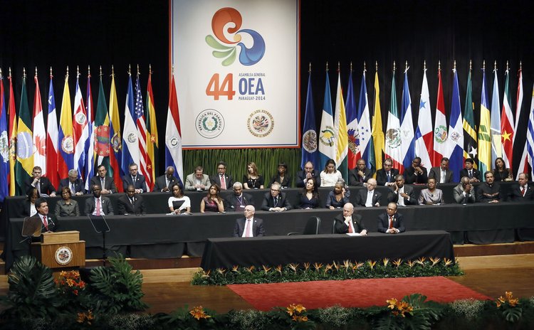 ASUNCION, June 4, 2014 (Xinhua) -- Paraguay's President Horacio Cartes (L, front) delivering a speech during the opening ceremony of the 44th General Assembly of OAS in Asuncion, Paraguay, June 3, 201