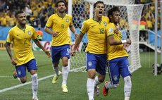 SAO PAULO, June 12, 2014 (Xinhua) -- Brazil's players celebrate after scoring the penalty kick during the opening match of 2014 FIFA World Cup, Arena de Sao Paulo Stadium, Sao Paulo, Brazil, June 12, 