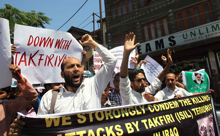 SRINAGAR, June 27, 2014 (Xinhua) -- Kashmiri Shiite Muslims shout slogans during a protest against Islamic State of Iraq and the Levant (ISIL) in Srinagar, summer capital of Indian-controlled Kashmir