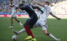 RIO DE JANEIRO, July 4, 2014 (Xinhua) -- France's Blaise Matuidi vies with Germany's Andre Schuerrle during a quarter-finals match between France and Germany of 2014 FIFA World Cup 