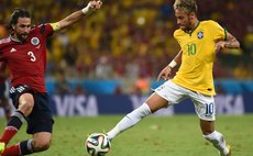 FORTALEZA, July 4, 2014 (Xinhua) -- Colombia's Mario Yepes (L) vies with Brazil's Neymar during a quarter-finals match between Brazil and Colombia of 2014 FIFA World Cup 