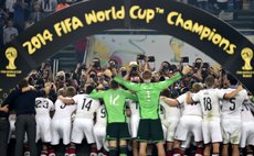 RIO DE JANEIRO, July 13, 2014 (Xinhua) -- Photographers take photos of Germany's players after the final match between Germany and Argentina of 2014 FIFA World Cup 