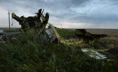 MOSCOW, July 18, 2014 (Xinhua) -- Photo taken on July 17, 2014 shows the debris at the crash site of a passenger plane near the village of Grabovo, Ukraine. 