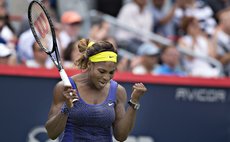 MONTREAL , Aug. 9, 2014 (Xinhua) -- Serena Williams of the United States reacts after winning the quarterfinal match against Caroline Wozniacki of Denmark during the Rogers Cup in Montreal, Canada.