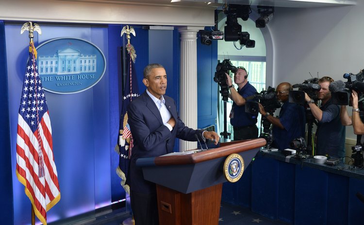 WASHINGTON D.C., Aug. 18, 2014 (Xinhua) -- U.S. President Barack Obama speaks at the press briefing room of the White House in Washington D.C., the  United States, Aug. 18, 2014