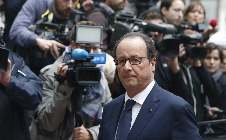 BRUSSELS, Aug. 30, 2014 (Xinhua) -- French President Francois Hollande at the European Council headquarters for the European Union (EU) special summit in Brussels, Belgium, August 30, 2014. 