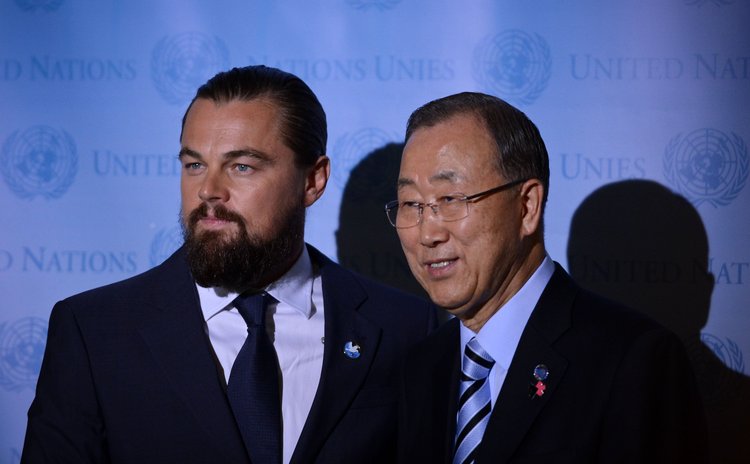 NEW YORK, Sept. 20, 2014 (Xinhua) -- UN Secretary-General Ban Ki-moon (R) and American actor Leonardo DiCaprio during at the UN headquarters in New York, on Sept. 20, 2014. 