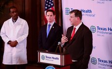 HOUSTON, Oct. 1, 2014 (Xinhua) -- Dallas Mayor Mike Rawlings (R) speaks during a press conference at Texas Health Presbyterian Hospital in Dallas, the United States, Oct. 1, 2014.