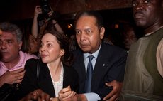 PORT AU PRINCE, Oct. 4, 2014 (Xinhua) -- Image taken on Jan. 16, 2011 shows Jean-Claude Duvalier (2nd R), former President of Haiti, during  his return to Haiti