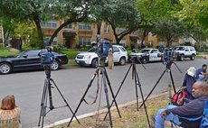 DALLAS, Oct. 12, 2014 (Xinhua) --  Reporters in front of the residence of a health care worker who tested positive for Ebola in Dallas, United States, on Oct 12, 2014